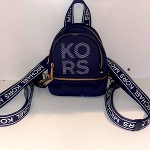 X-small Michael Kors navy blue convertible backpack